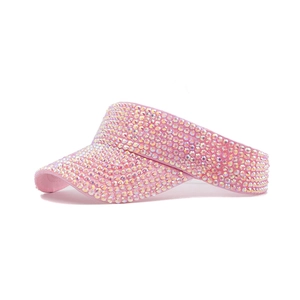Pink rhinestone sun visor hat for women with shimmering rainbow crystals in 45-degree view