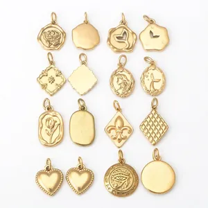 Matte gold stainless steel pendants featuring flower, heart, and mermaid tail motifs
