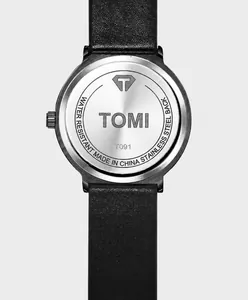 Close-up of the stainless steel back and leather strap of the TOMI T091 watch