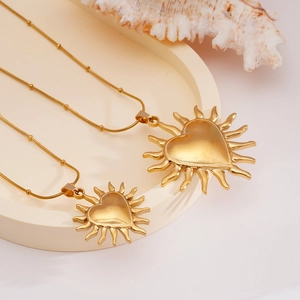18K gold plated stainless steel necklace with sunburst heart pendants on bead chain