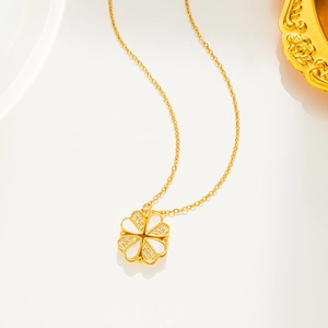 Convertible gold clover heart necklace with white shell inlay and sparkling crystals