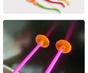 Close-up of safety suction cup arrows and colorful plastic bow parts for kids