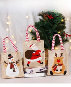 Three-piece set of burlap Christmas gift bags featuring snowman, Santa, and reindeer