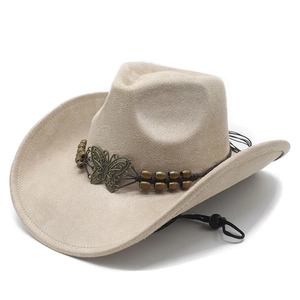 Vintage suede western cowboy hat with wide brim and decorative metal butterfly and beads