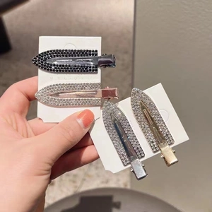 Sparkly rhinestone duckbill hair clips in gold and silver metal for women and girls