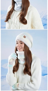 Detail of winter rainbow knit hat scarf and gloves set with soft plush texture on snow background