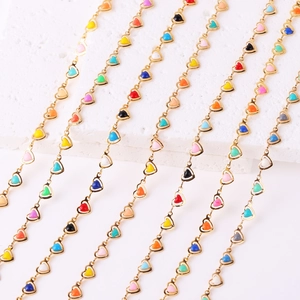 Golden chain bracelet with colorful enamel heart pendants for a stylish women's look