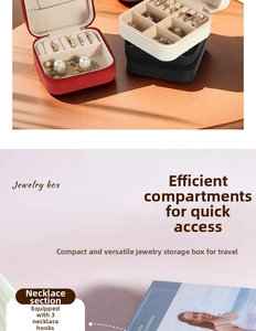 Detail of travel jewelry box with 3 necklace hooks and multi-functional storage slots