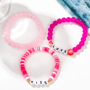 Detailed set of 3 handmade beaded bracelets with LOVE and KISS charms for Valentine's gift