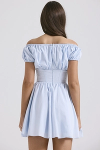 Rear view of light blue off-shoulder dress showing waist stitching and fabric texture