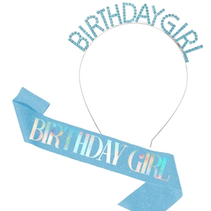 Detailed view of light blue glitter birthday sash and silver rhinestone crown tiara set