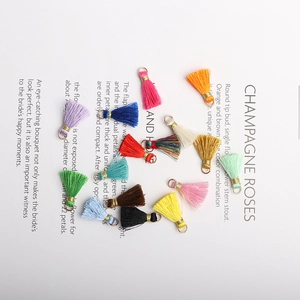 Assorted colorful DIY tassel pendants with metal rings for jewelry and bag accessories
