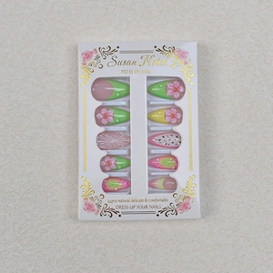24-piece almond press-on nails with 3D floral designs and fruit-inspired pearl accents