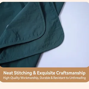 Waterproof dark green apron vest featuring durable fabric and reinforced stitched edges