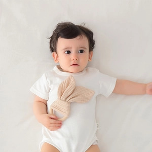 Soft beige cotton gauze baby security blanket toy with natural wooden ring and bunny ears