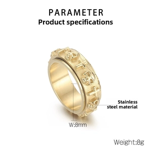 Detail view of 8mm stainless steel spinning ring with cross and skull relief icons