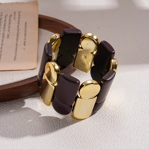 Exaggerated geometric acrylic and gold metal stretch bracelet in vintage deep brown and gold