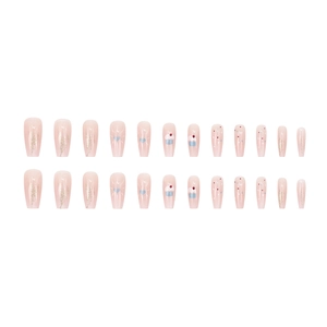 Short coffin press-on nails with pink base, cupcake patterns, and glitter gradient design