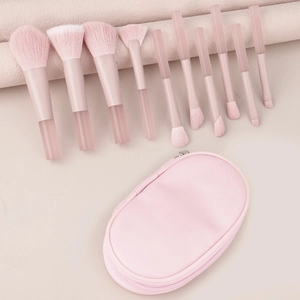 Set di 10 pennelli da trucco rosa con manici traslucidi e astuccio coordinato