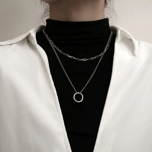 Minimalist silver double-layer necklace with simple chain and polished ring pendant