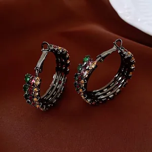 Vintage style hoop earrings with multicolor zircon stones on dark gunmetal plating