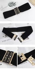 Detail of black elastic corset belt with gold leaf buckle and rivet studs decoration
