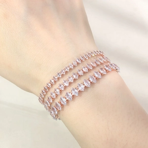 Close-up of rose gold adjustable tennis bracelet set with marquise-cut cubic zirconia