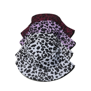 Detailed stack of leopard print bucket hats in white, purple, and burgundy color options