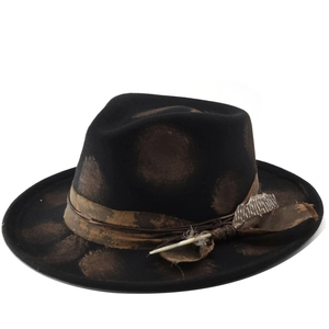 Black fedora sun hat with brown distressed dye and feather trim on a white background