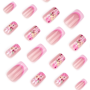 Pink French square press-on nails with cute floral and cherry designs on white background