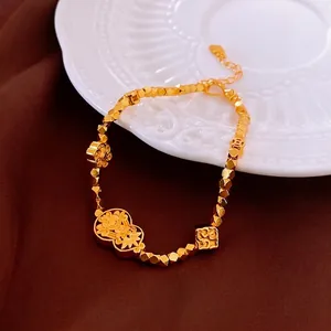 Elegant gold-plated flower and gourd bracelet with Chinese traditional charms