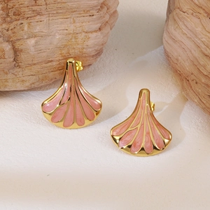 Vintage gold fan-shaped earrings with soft pink enamel inlay on a natural stone base