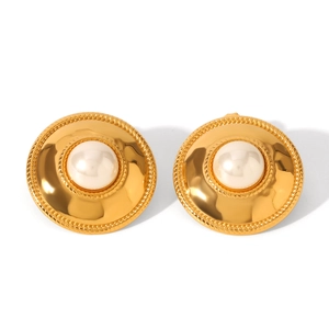 Detailed macro view of golden flower earrings featuring round pearls and twisted texture