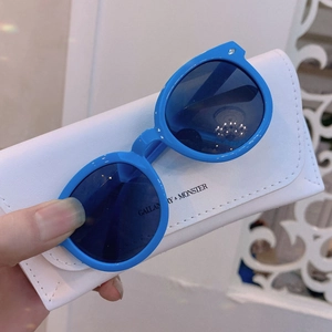 Blue round children sunglasses and white leather storage pouch with premium texture
