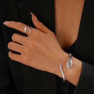 Silver snake-shaped wrap ring and cuff bracelet set with high-polish metallic finish