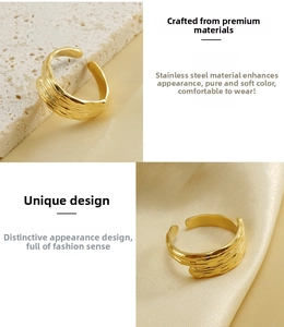 Detailed view of adjustable gold stainless steel ring with irregular lava texture