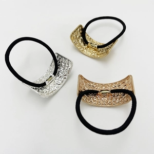 Three-piece set of U-shaped elastic hair ties with gold, silver, and rose gold metal buckles
