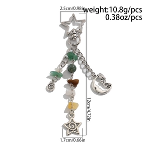 Detailed view of moon and star keychain with turquoise beads and silver-tone pendants