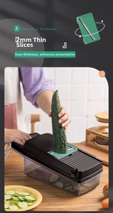 Detail of multi-functional vegetable slicer creating 2mm thin cucumber slices in kitchen