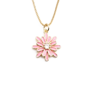 Elegant gold necklace with a pink daisy enamel pendant and a clear sparkling gemstone