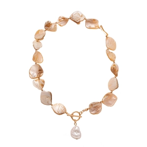 Irregular shell and baroque pearl necklace with golden OT buckle closure on white background