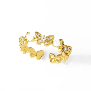 Gold-plated butterfly ring with white pearls and sparkling zircons for women