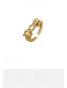 Detail view of gold leopard ring showing zircon inlays and weight specifications