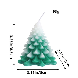 Snow-capped Christmas tree candle dimensions showing height of 8.5cm and width of 8cm