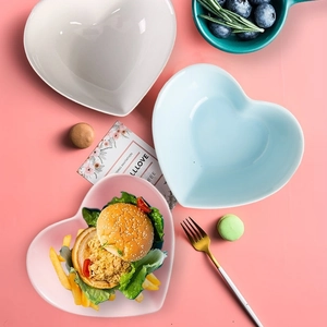 Three-piece heart-shaped ceramic bowls in pastel colors for dessert and breakfast