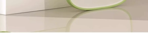 Detail of food-grade antibacterial cutting board with green anti-slip border