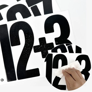 Waterproof 6-inch large black vinyl number stickers 1 2 3 showing water resistance