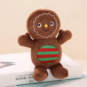 Detailed view of gingerbread man plush doll with white wavy stitching and striped fabric