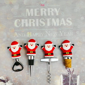 Detail view of a 4-piece Christmas Santa wine tool set with stoppers and openers