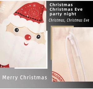 Detail of canvas Christmas drawstring bag showing drawstring closure and Santa Claus print